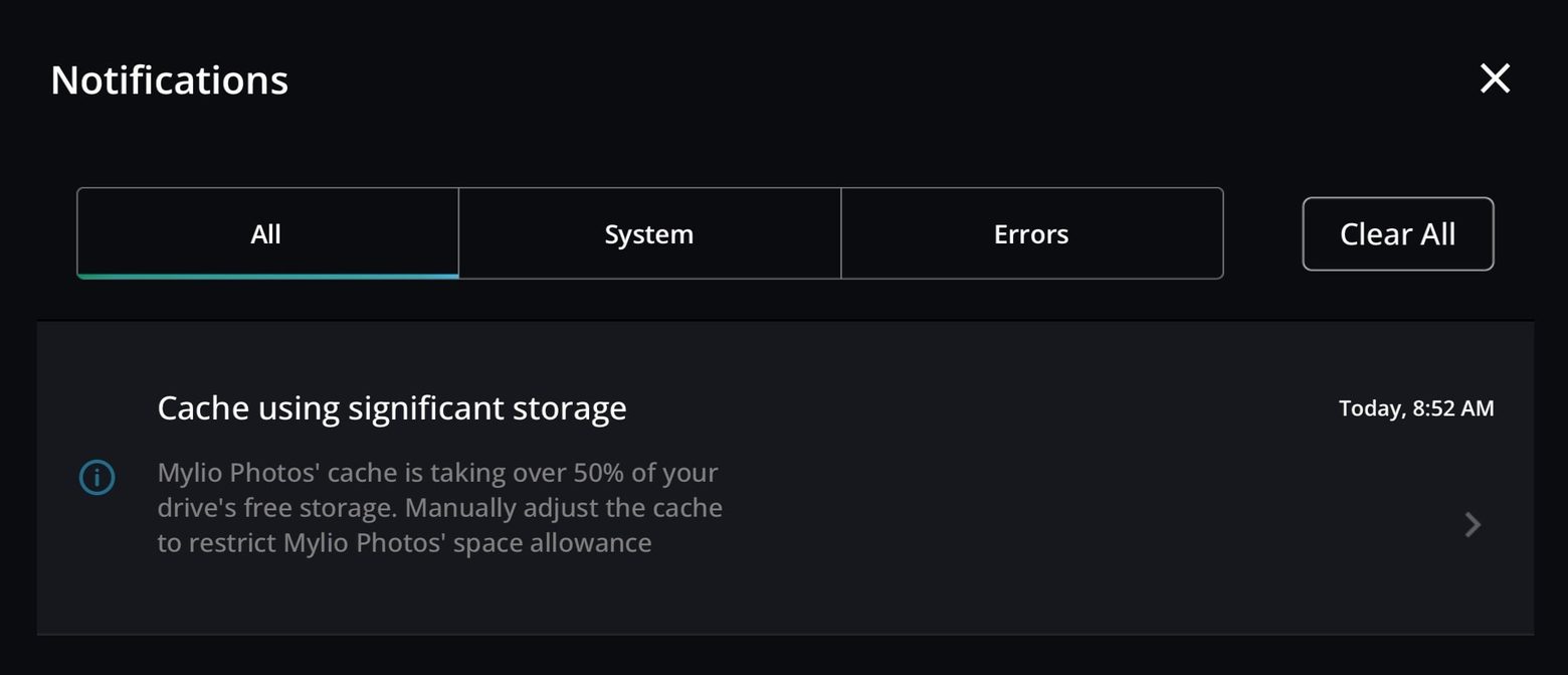 The Notifications panel showing "Cache using significant storage", which says the cache is taking over 50% of the drive's free storage.