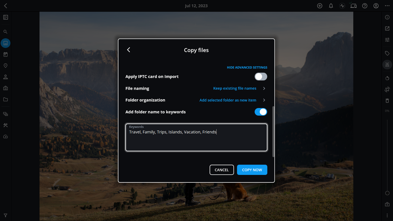 The Copy files dialog with advanced settings shown, "Add folder name to keywords" turned on, and keywords typed in the Keywords box.