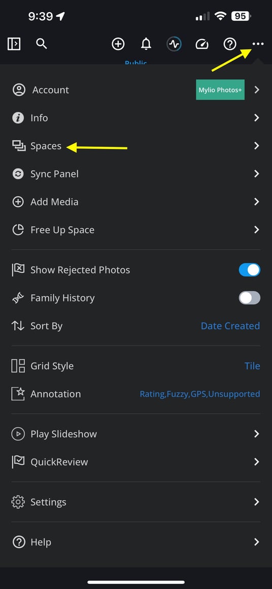 The More menu open on an iPhone, with arrows pointing to the More button and to Spaces.