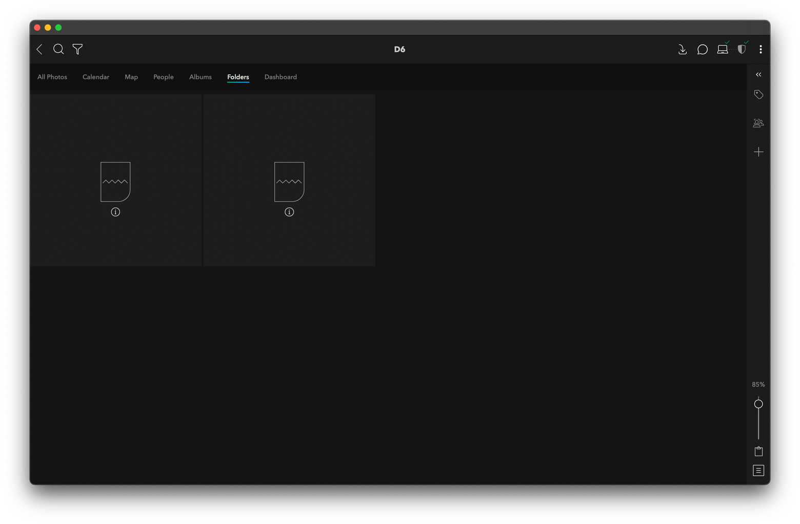 The Folders view in Mylio showing two gray squares with a placeholder icon where photo thumbnails should be.