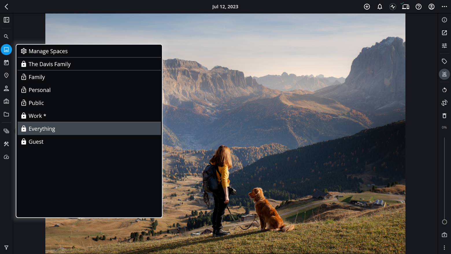 The Spaces selector open over a photo, with Everything highlighted in the list of Spaces.